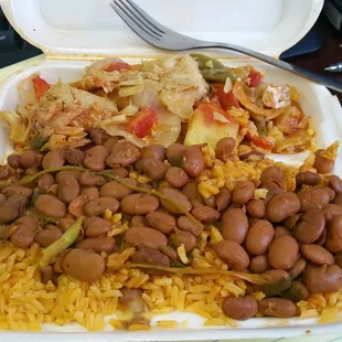 Yellow rice, beans and cod fish. $3.99