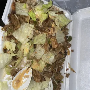 HAIR covered chicken and lamb over rice