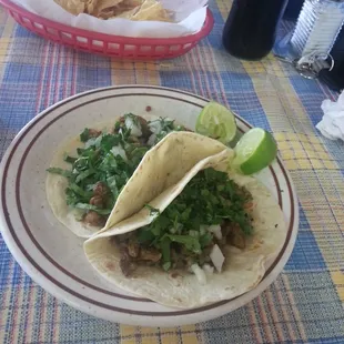 Tacos flour tortillas steak and AL pastor