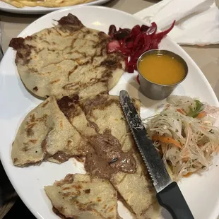 Pupusa beans and cheese with slaw and pickled onions, fries