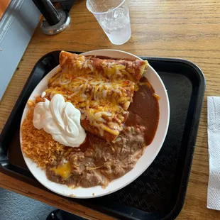 Enchiladas de pollo for my picky kid. She loved it!