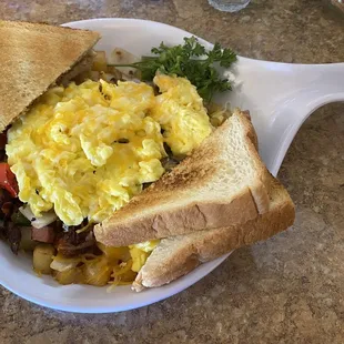 a plate of eggs and toast
