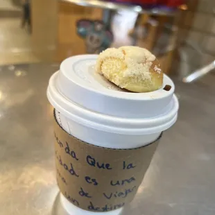 Hot chocolate with a concha on top! Personalized handwritten quotes on the coffee holder