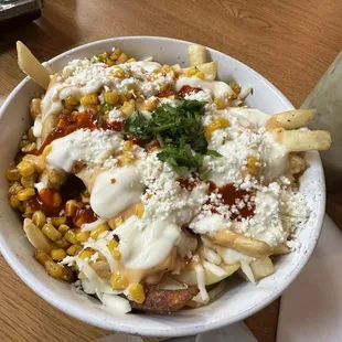 Chasca Loca -  fries with corn, mayo, chimichurri, queso fresco, and cilantro.