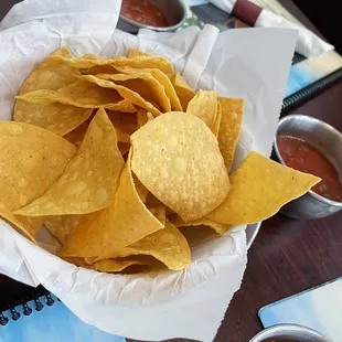 a bowl of chips and salsa