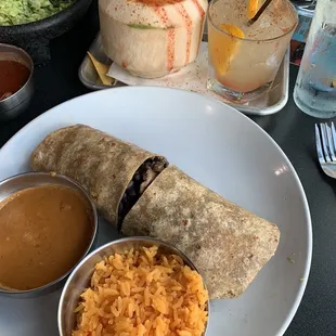 a burrito, rice and salsa