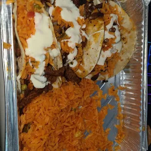 2 steak tacos and rice