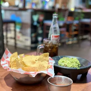 Table-side guacamole, chips, salsa, Mexican Coke