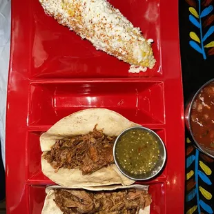 Carnitas street tacos with elote-style corn