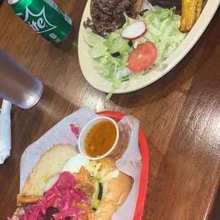 Pan con pollo and carne asada well done next time I will ask the lady for no pink repollo in my preference delicious tho !