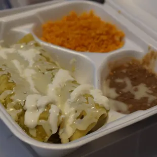 a meal in a styrofoam container