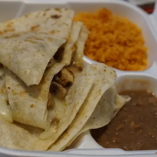 a meal in a styrofoam container