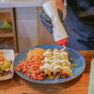 a person in a kitchen preparing food