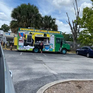 a food truck parked in a parking lot