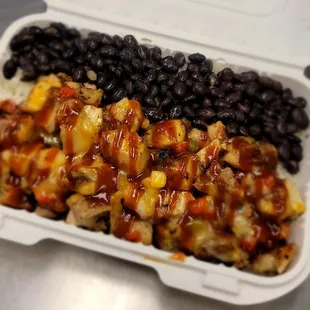 Ultimate Island Smoked Chicken Rice Bowl

Topped with sautéed onions, green/red peppers, 3 cheese blend and our homemade guava BBQ.