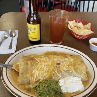 El Jefe breakfast burrito w/ chorizo &amp; a Pacifico michelada