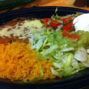 Toppings for my Fajita- Served with beans, lettuce, guacamole, sour cream, rice and three tortillas.