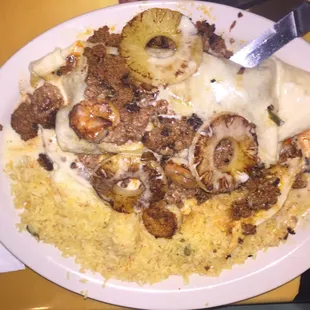 The new steak, beef, chicken and shrimp burrito with pineapples, yum!