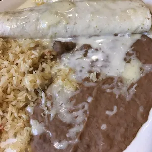 Number 17: burrito, enchilada, beans and rice, sub cheese sauce +1.50