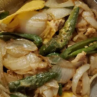 Well Done Chicken Fajita Nachos with Jalapeños.