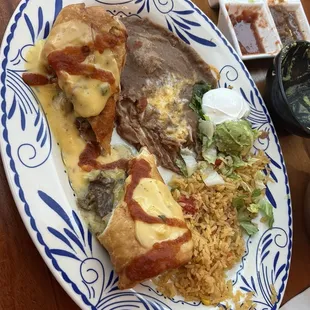 Pick 3 Flauta, Enchilada &amp; Mini Chimichanga with fried rice &amp; refried beans.