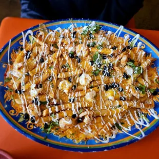 Fries with grilled shrimp amd casa sauce