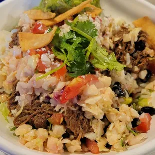 Barbacoa Bowl as suggested by the server. Delicious! Black beans cooked to perfection. So fresh!