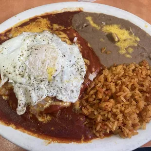 Flat enchiladas with an egg on it!