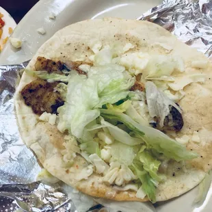 Fish taco was mostly cheese and lettuce.