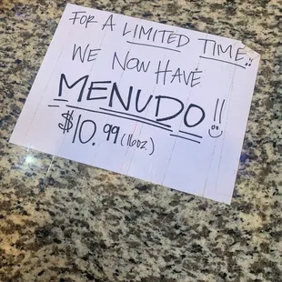 a sign on a counter