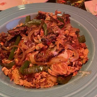 Rice Bowl chicken and chorizo. So good!!  Ask for a side of Queso and drizzle on top. You can thank me later.