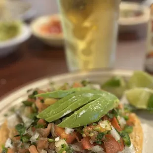 Perfect in a hot day! Just walking by and stopped in for a ceviche tostada and ice cold beer. AMAZING
