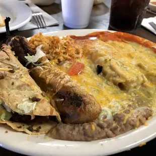 The combination plate. The I would recommend skipping the rice. Everything else was good. Behind is an open faced quesadilla.