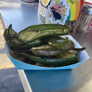 Grilled jalapeños and grilled onion side $2