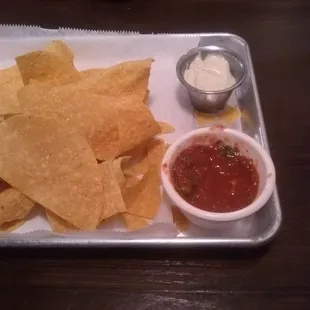 Chips, salsa, and spicy ranch dip.