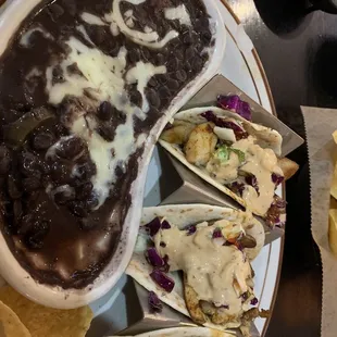 Fish (tilapia) flour tacos with black beans