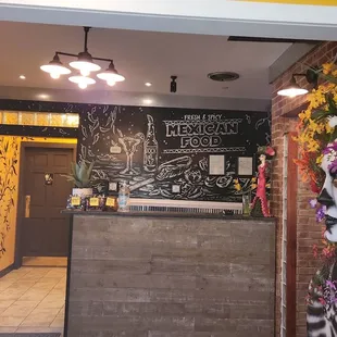 the entrance to a mexican restaurant