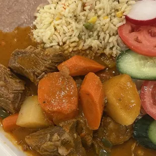 Carne Guisada - our absolute favorite dish! Recommend by the owner, and we can&apos;t get enough of it!