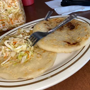 One Pork, bean, and cheese; one bean and cheese papusa