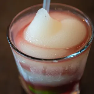 a close up of a drink in a glass