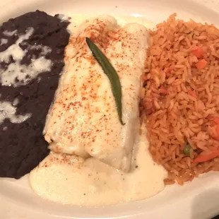 Chicken enchiladas and cream sauce