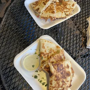 two plates of quesadillas