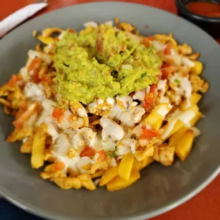 The Chicken Nacho Fries are a hidden gem here. You won&apos;t find them on the menu, but they are fantastic.