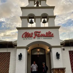 Mi Familia grand entrance! With the statue up above of Saint Anthony of Padua and two bells hanging.