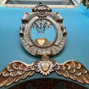 These beautiful wings up above and a mirror, don&apos;t you love this color blue.