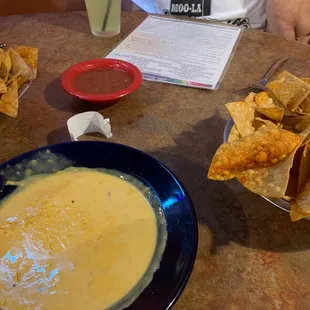 Large queso and their famous chips. Their fresh salsa rocks too!