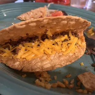 a taco with cheese