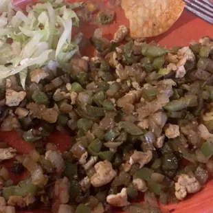 Suppose to be chicken Tacos Al Carbon, instead it's green peppers and onions with a little pieces of chicken.