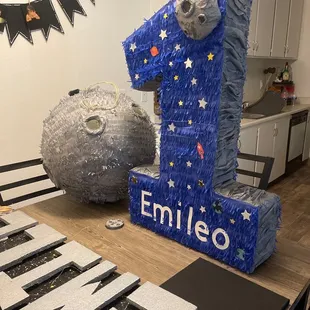 1st Birthday space theme piñatas