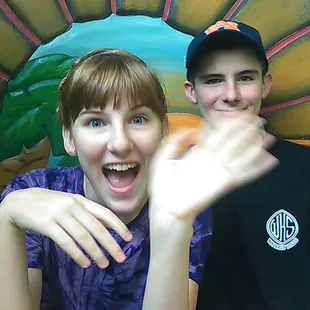 a man and a woman posing for a picture